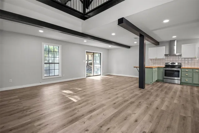 a view of kitchen and windows