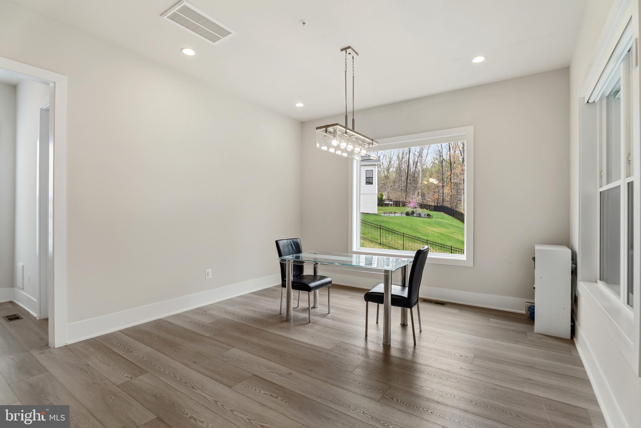 12444 Potomac Hunt Road North Potomac, MD 20878 - Photo 12 of 47 Bright and airy dining space awaits.