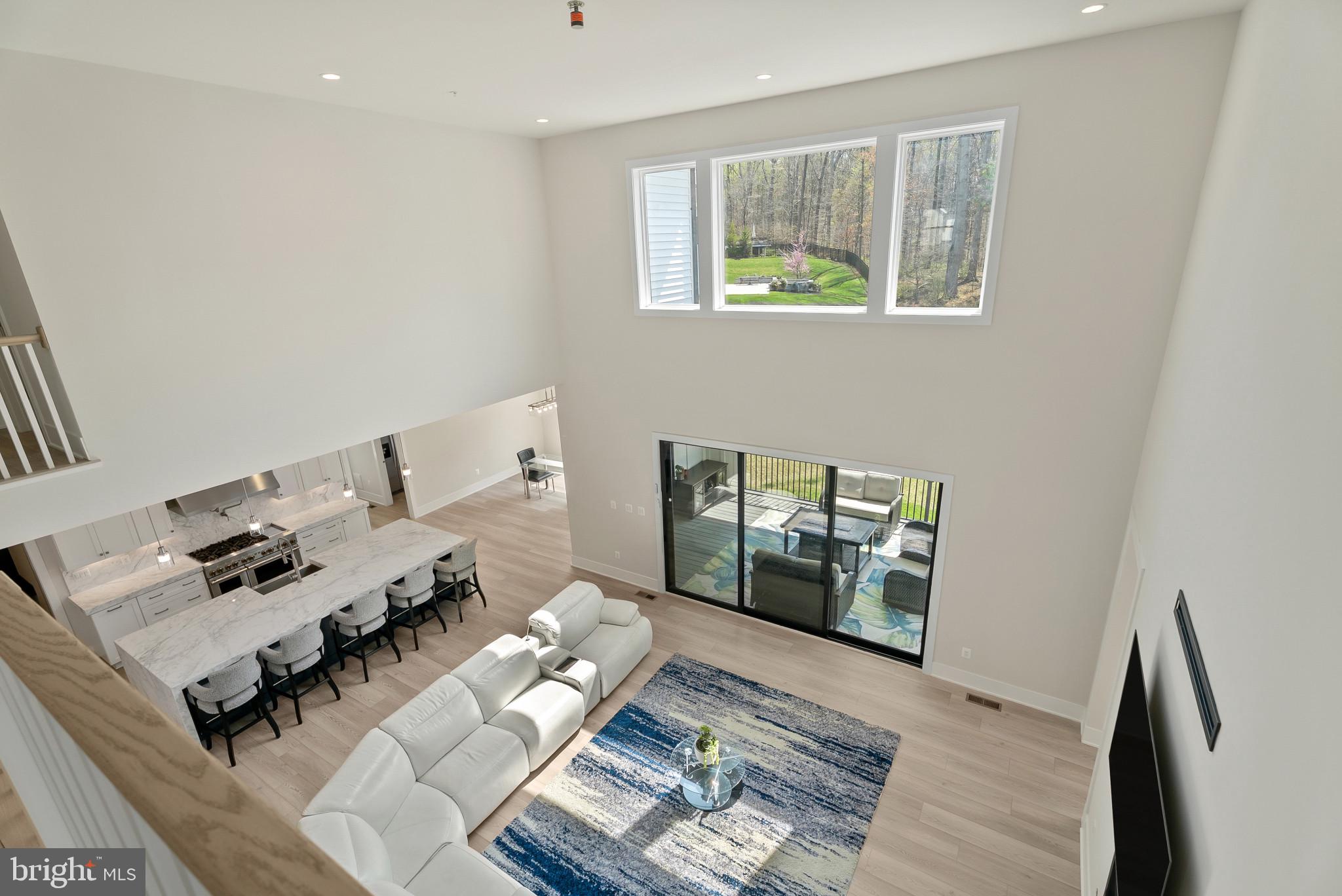 12444 Potomac Hunt Road North Potomac, MD 20878 - Photo 19 of 47 Spacious modern living with nature views.