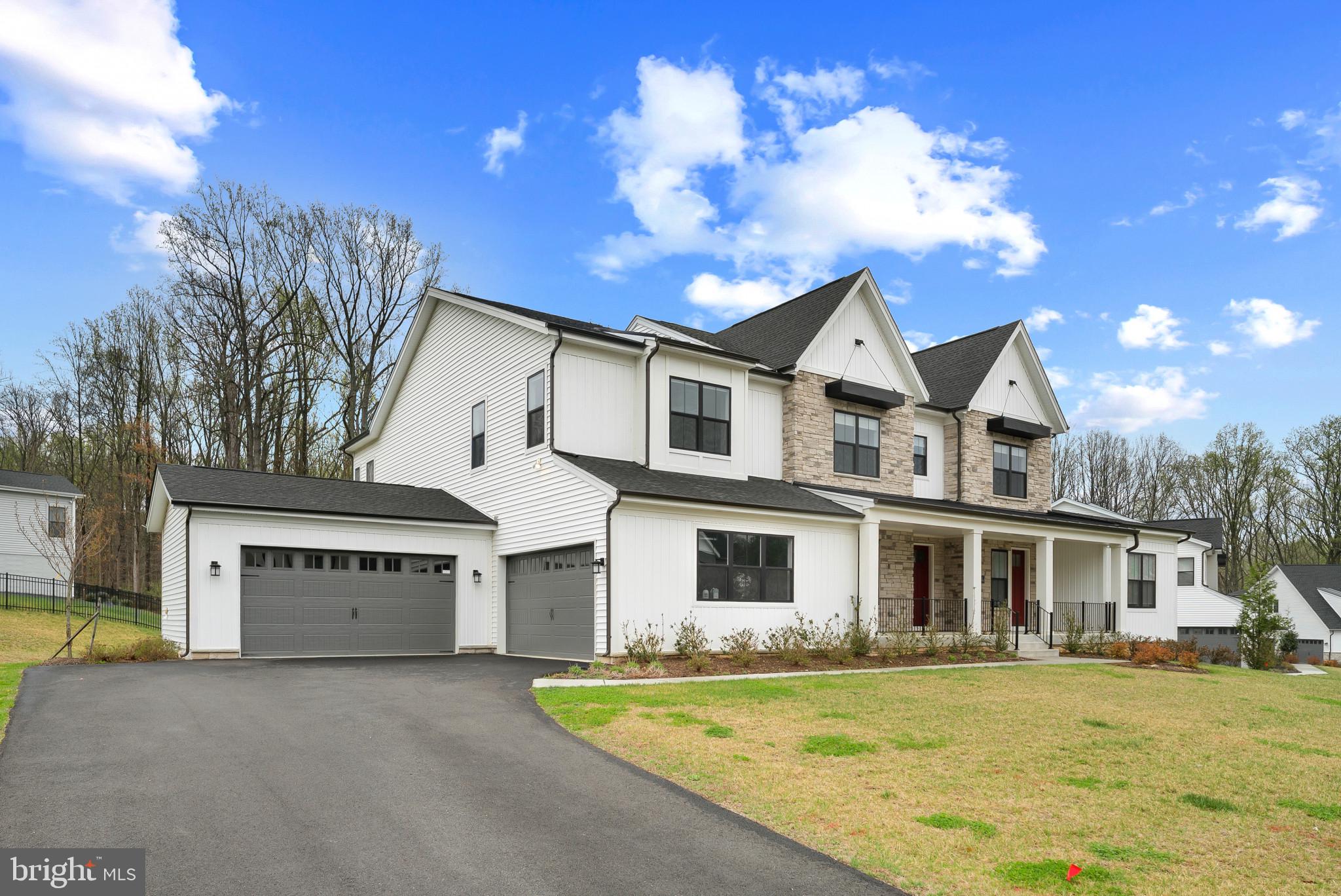 12444 Potomac Hunt Road North Potomac, MD 20878 - Photo 3 of 47 Charming modern home with lush surroundings.