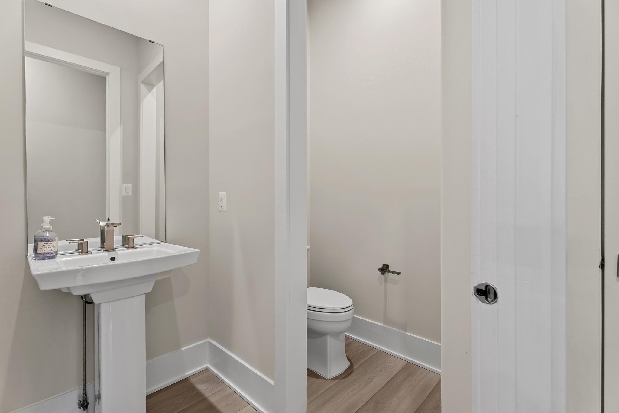 12444 Potomac Hunt Road North Potomac, MD 20878 - Photo 36 of 47 Sleek and modern front entrance half-bath