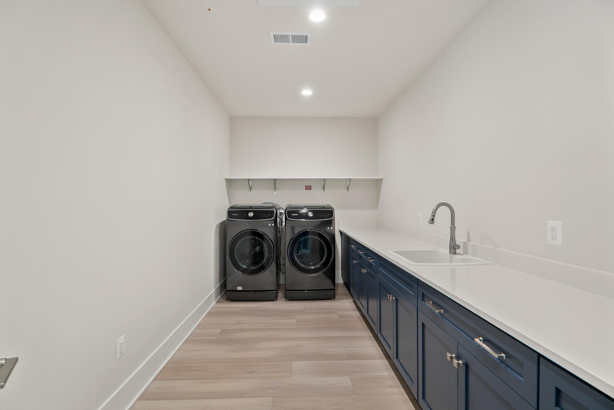 12444 Potomac Hunt Road North Potomac, MD 20878 - Photo 37 of 47 Upstairs laundry room