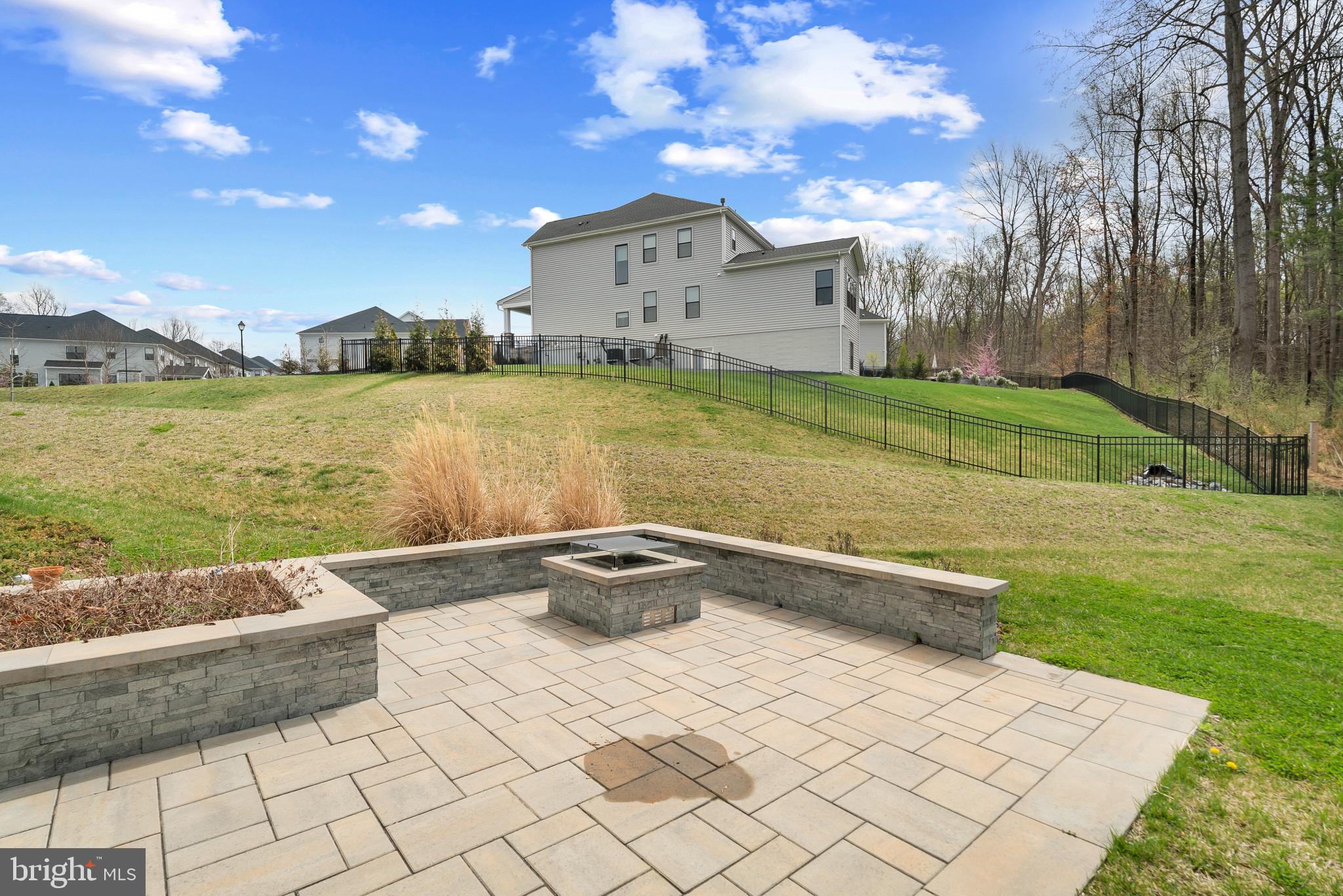 12444 Potomac Hunt Road North Potomac, MD 20878 - Photo 44 of 47 Serene backyard retreat with fire pit.