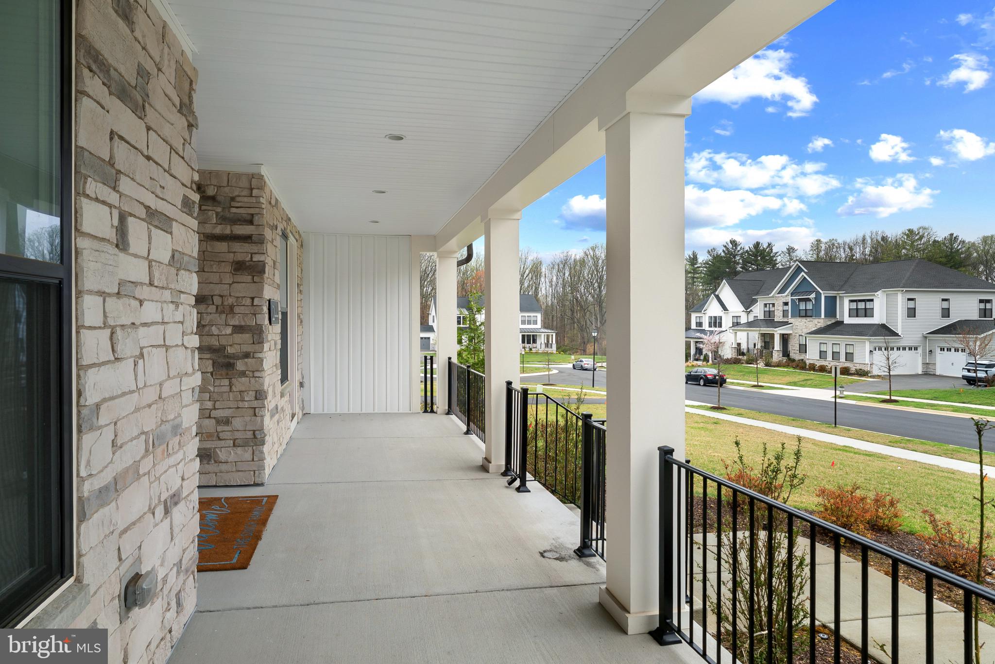 12444 Potomac Hunt Road North Potomac, MD 20878 - Photo 5 of 47 Charming porch with scenic views.