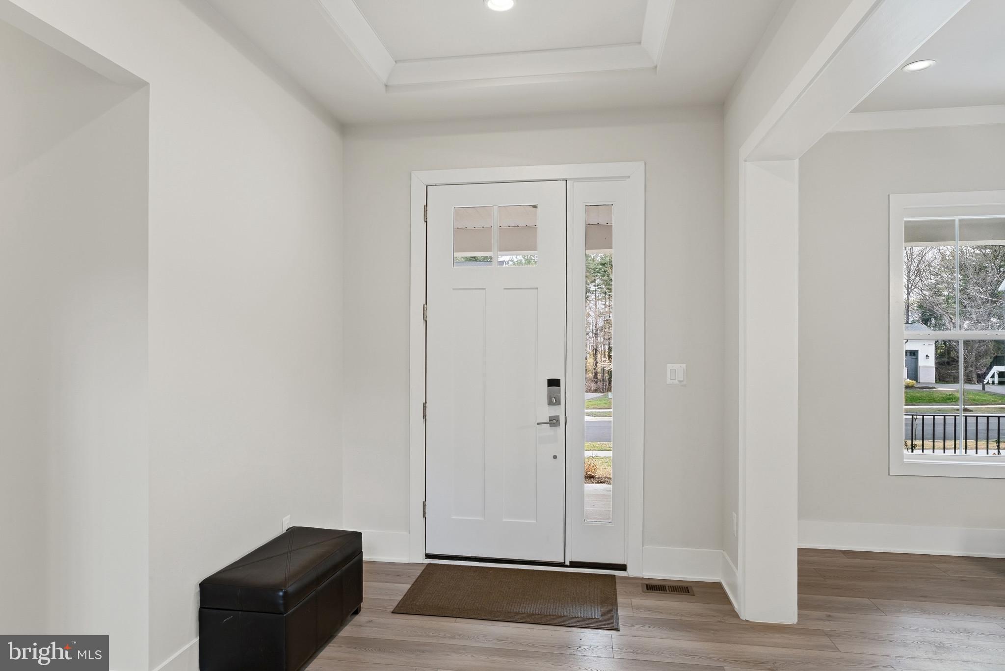 12444 Potomac Hunt Road North Potomac, MD 20878 - Photo 6 of 47 Welcoming entryway with natural light.