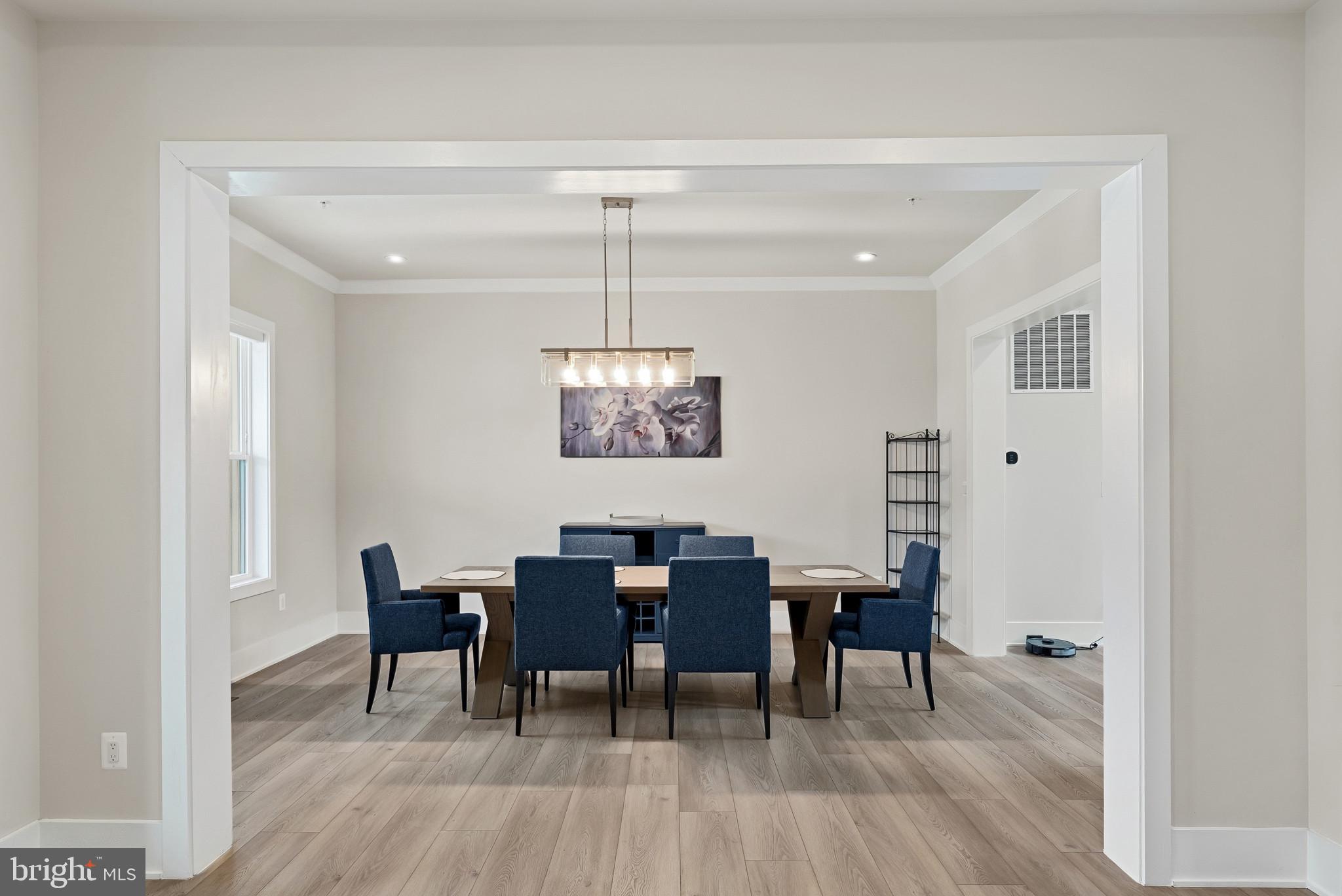 12444 Potomac Hunt Road North Potomac, MD 20878 - Photo 7 of 47 Elegant dining space with modern charm.