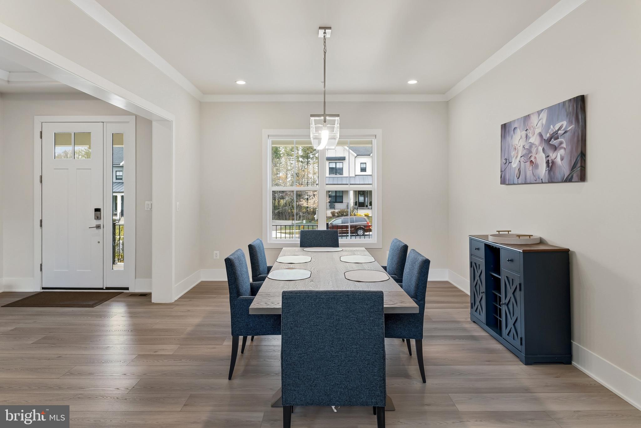 12444 Potomac Hunt Road North Potomac, MD 20878 - Photo 8 of 47 Modern dining space with natural light.