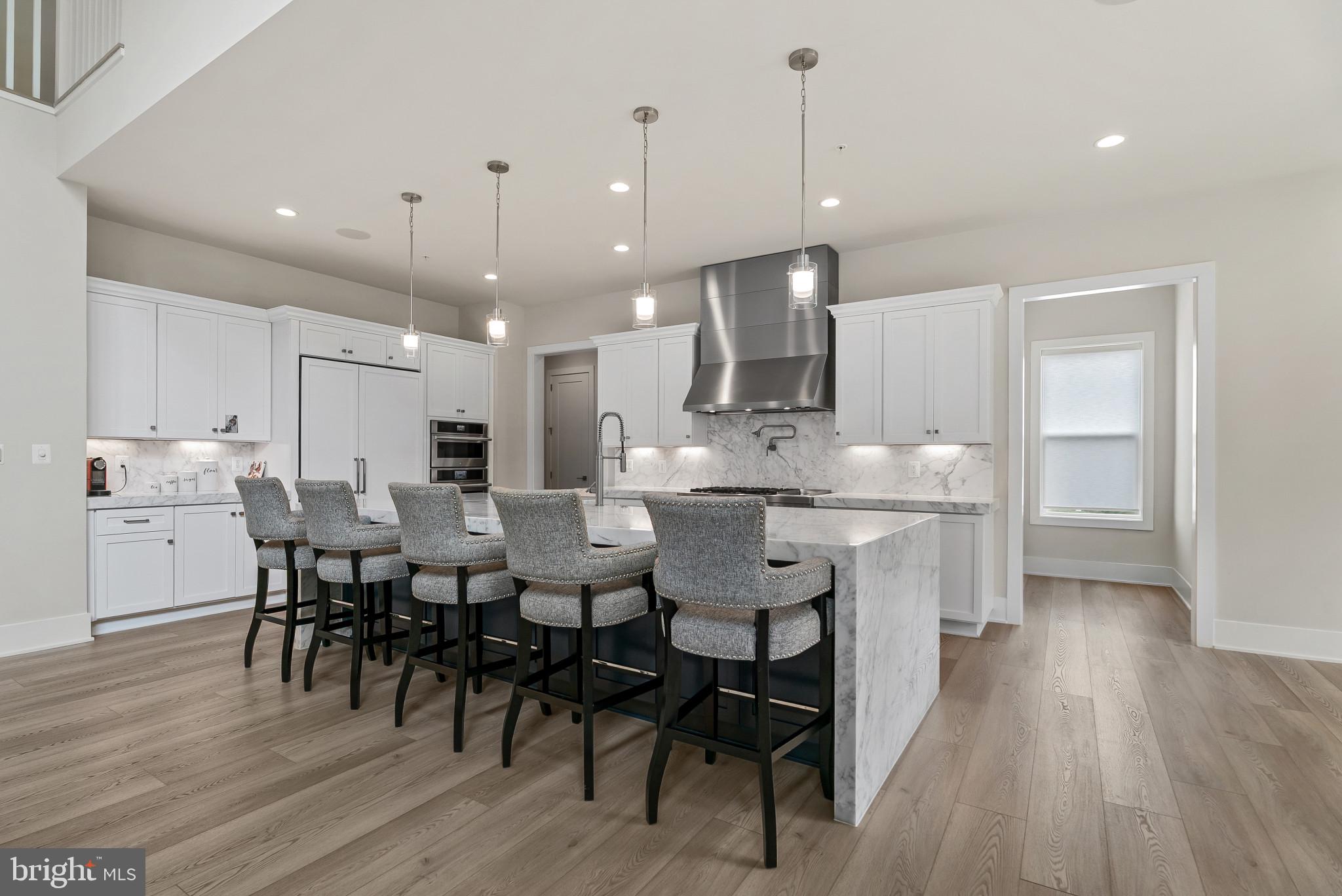 12444 Potomac Hunt Road North Potomac, MD 20878 - Photo 9 of 47 Sleek modern kitchen with elegant finishes.