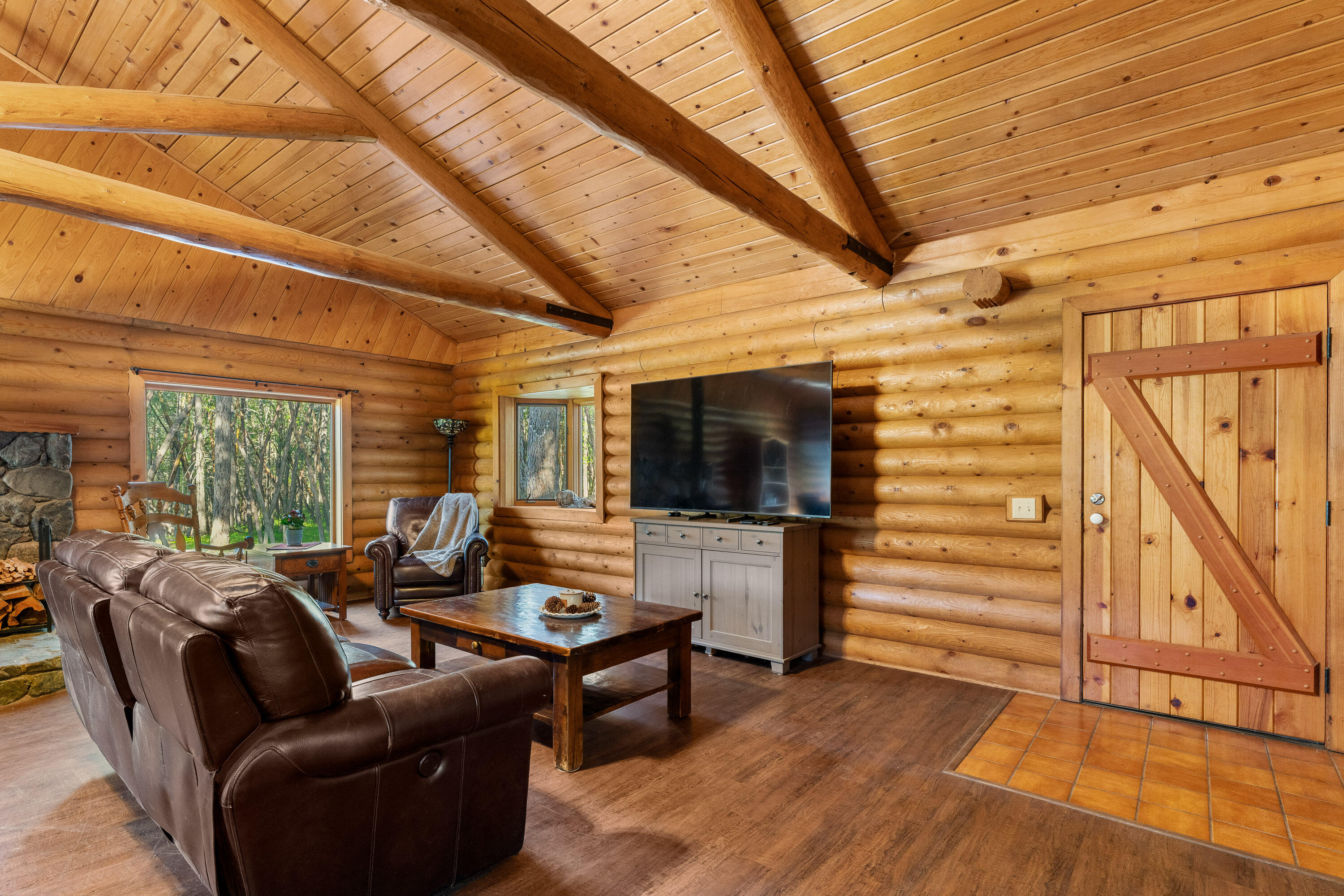 1201 Reeves Creek Road Selma, OR 97538 - Photo 6 of 38 a living room with furniture and a flat screen tv