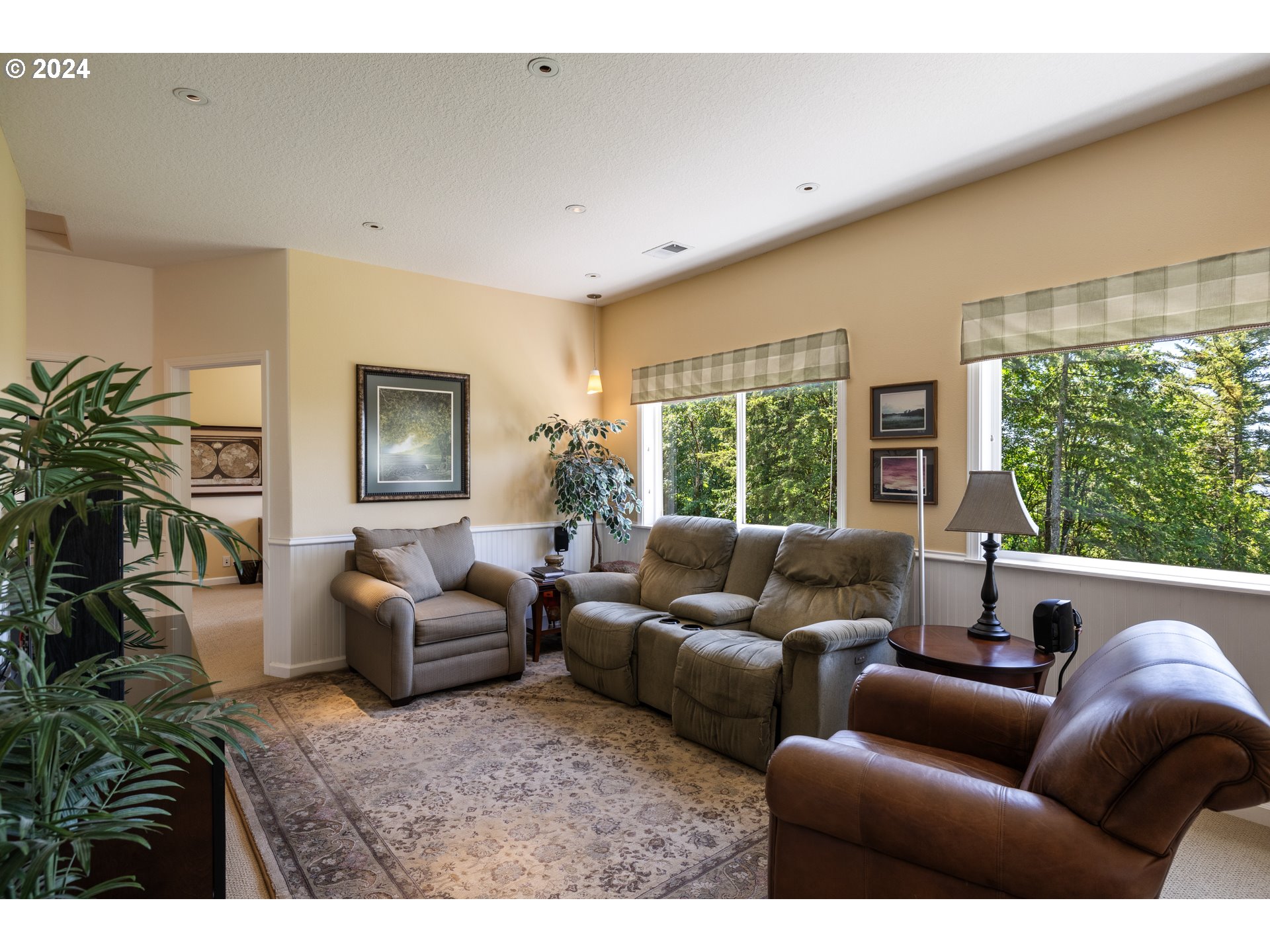 19100 Southwest Finnigan Hill Road Newberg, OR 97132 - Photo 26 of 48 a living room with furniture and a large window