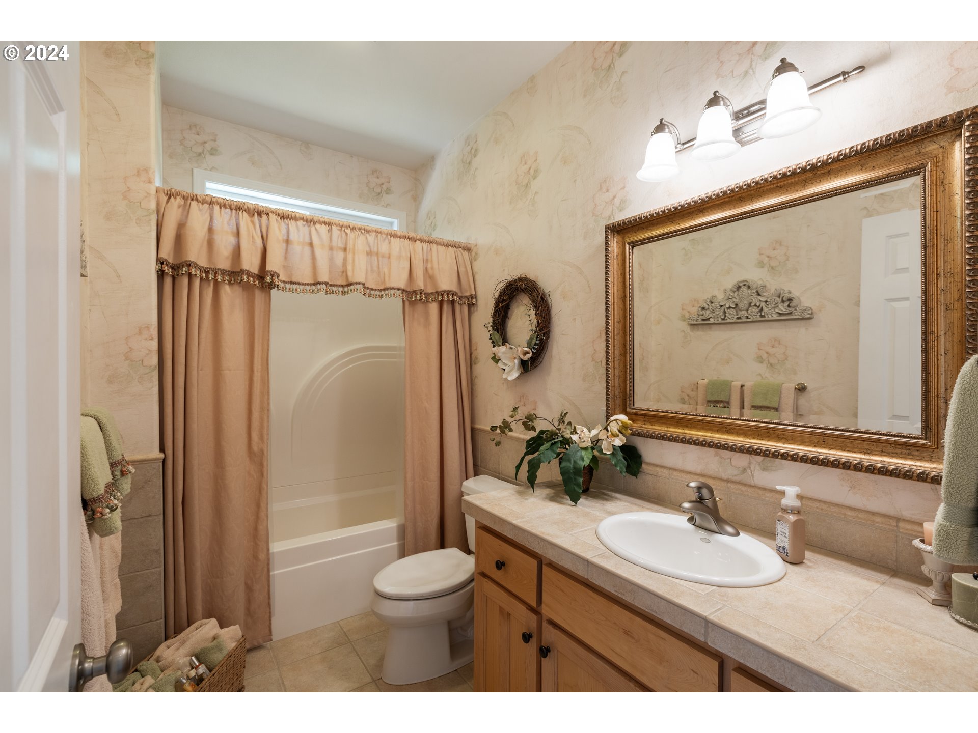 19100 Southwest Finnigan Hill Road Newberg, OR 97132 - Photo 30 of 48 a bathroom with a sink mirror toilet and shower