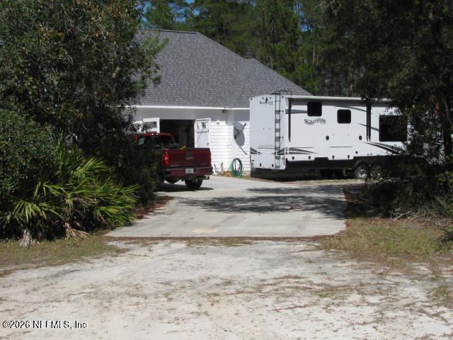 200 Mockingbird Court Georgetown, FL 32139 - Photo 15 of 30 DRIVE WAY TO HOUSE IMG_0030