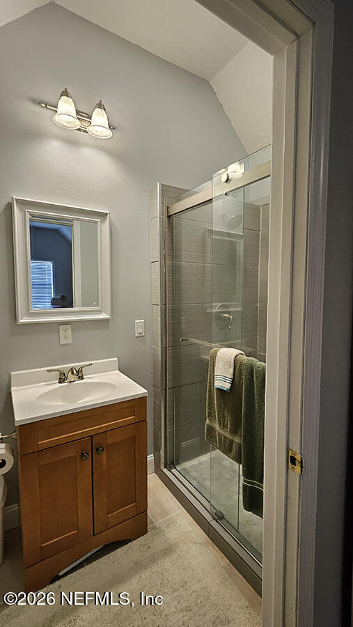 200 Mockingbird Court Georgetown, FL 32139 - Photo 27 of 30 a bathroom with a sink a toilet and a mirror
