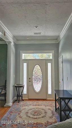 a bathroom with a sink double vanity and a mirror