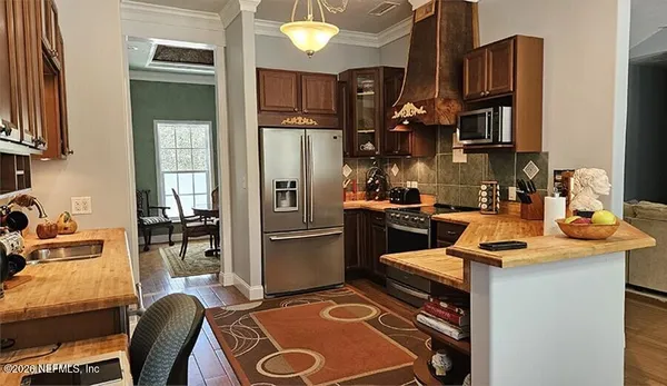 a view of a house with a street