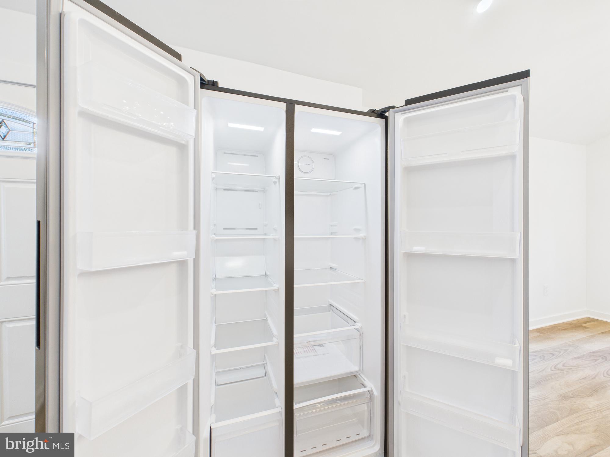 944 Balboa Avenue Capitol Heights, MD 20743 - Photo 16 of 49 a bathroom with a glass shower door