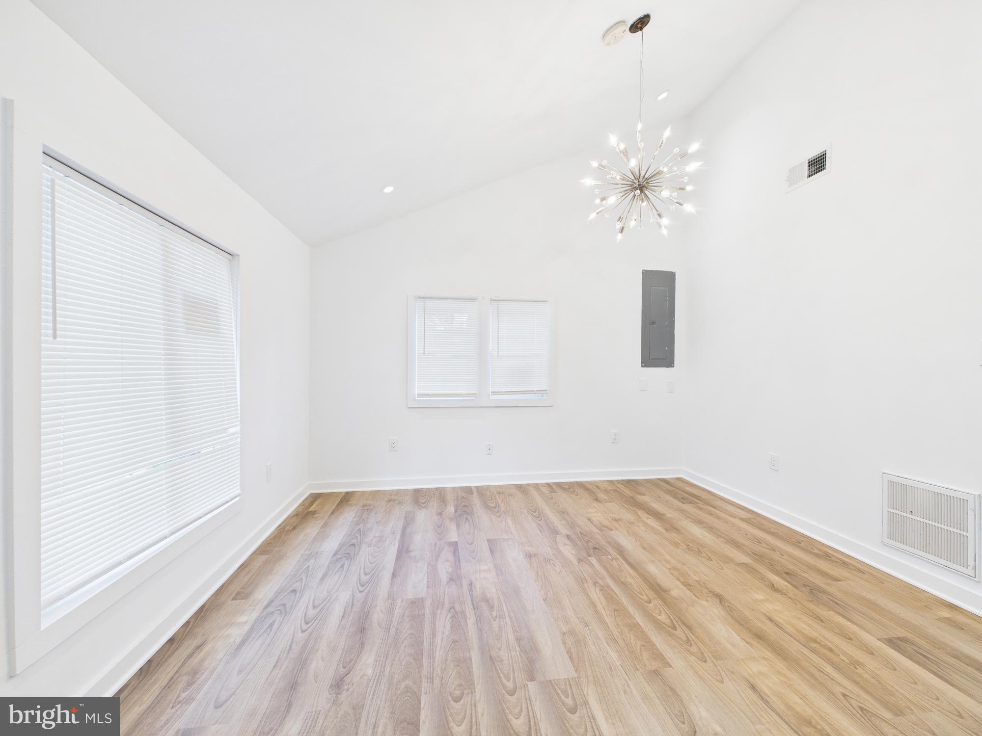 944 Balboa Avenue Capitol Heights, MD 20743 - Photo 19 of 49 wooden floor in an empty room with a window