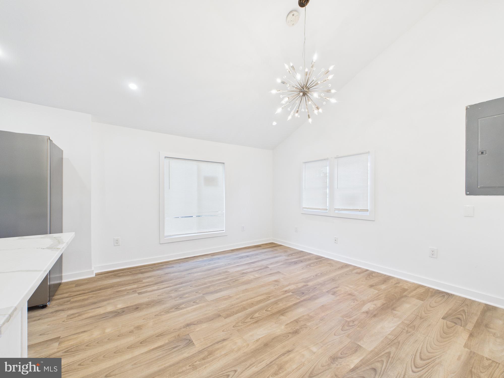 944 Balboa Avenue Capitol Heights, MD 20743 - Photo 21 of 49 a view of empty room with wooden floor and fan