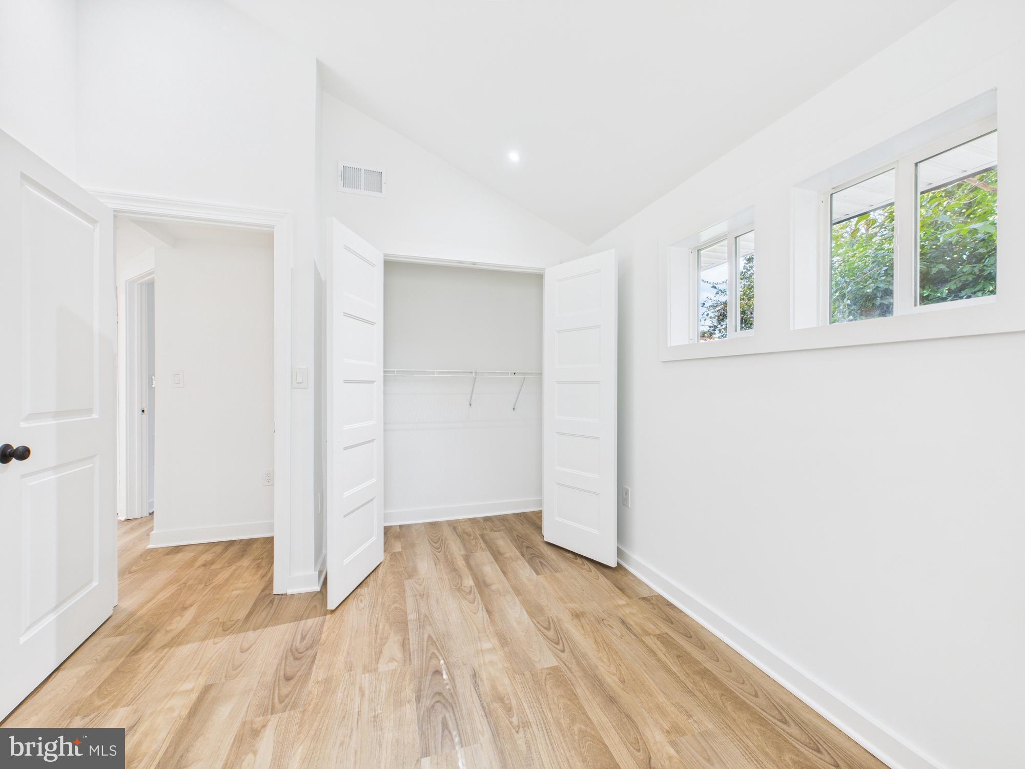 944 Balboa Avenue Capitol Heights, MD 20743 - Photo 25 of 49 wooden floor in an empty room with a window
