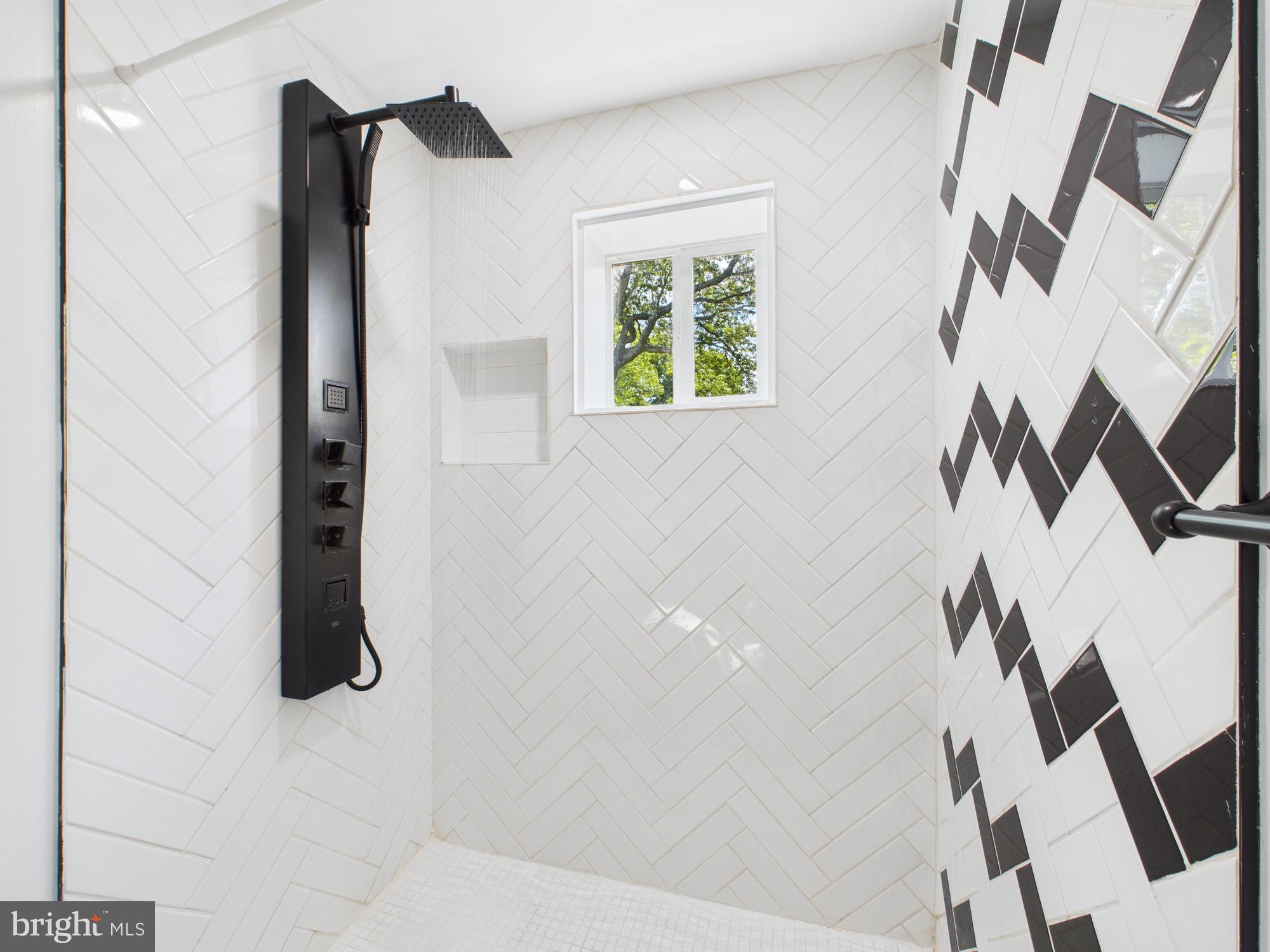 944 Balboa Avenue Capitol Heights, MD 20743 - Photo 30 of 49 a bathroom with a shower