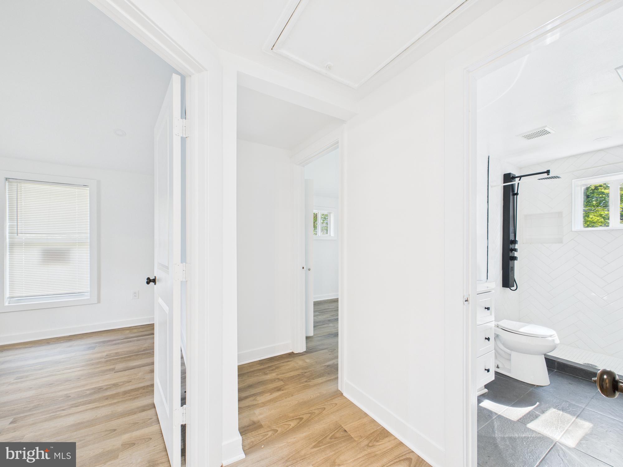 944 Balboa Avenue Capitol Heights, MD 20743 - Photo 32 of 49 a bathroom with a toilet sink and a mirror