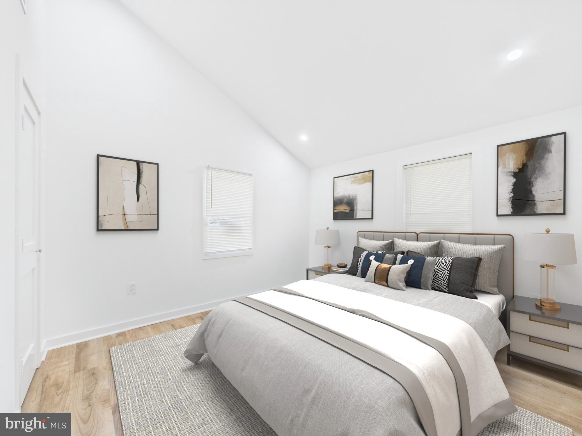 944 Balboa Avenue Capitol Heights, MD 20743 - Photo 5 of 49 a bedroom with a bed and a night stand