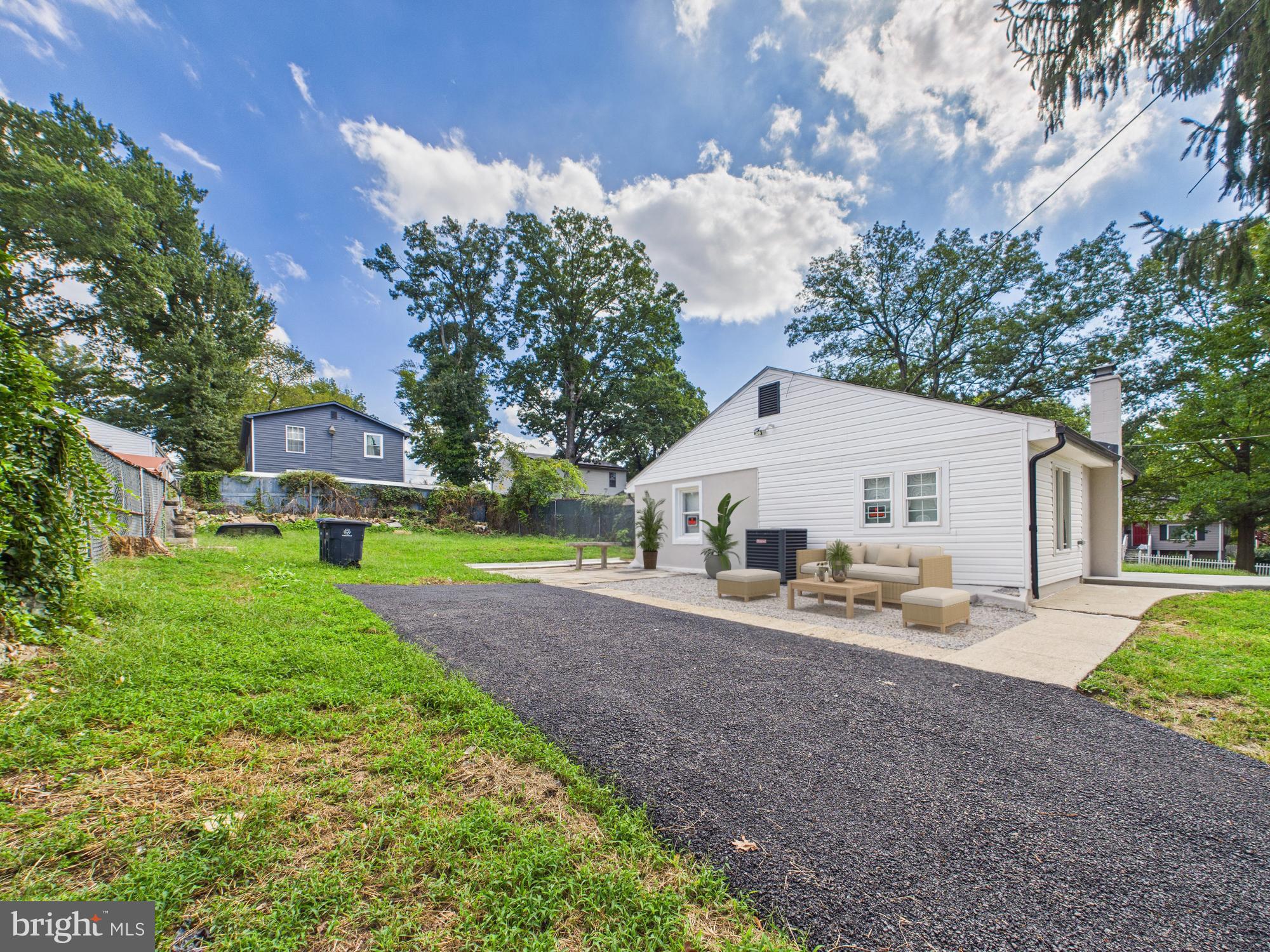 944 Balboa Avenue Capitol Heights, MD 20743 - Photo 7 of 49 a view of a house with a yard and large tree