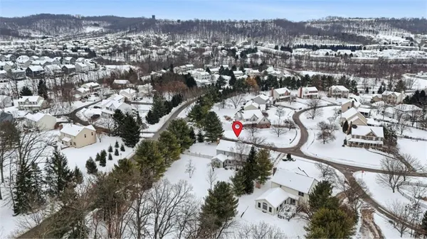 a picture of a room with a refrigerator