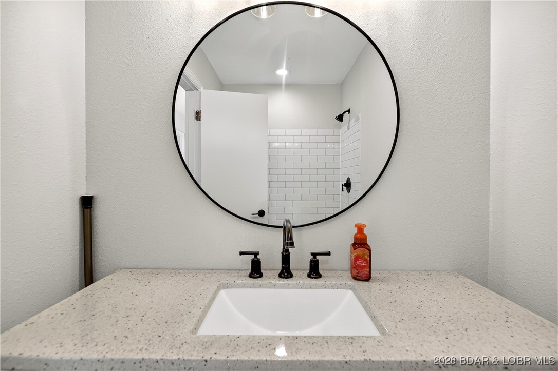 43 Good Neighbors Loop Camdenton, MO 65020 - Photo 23 of 68 Main Level Bathroom