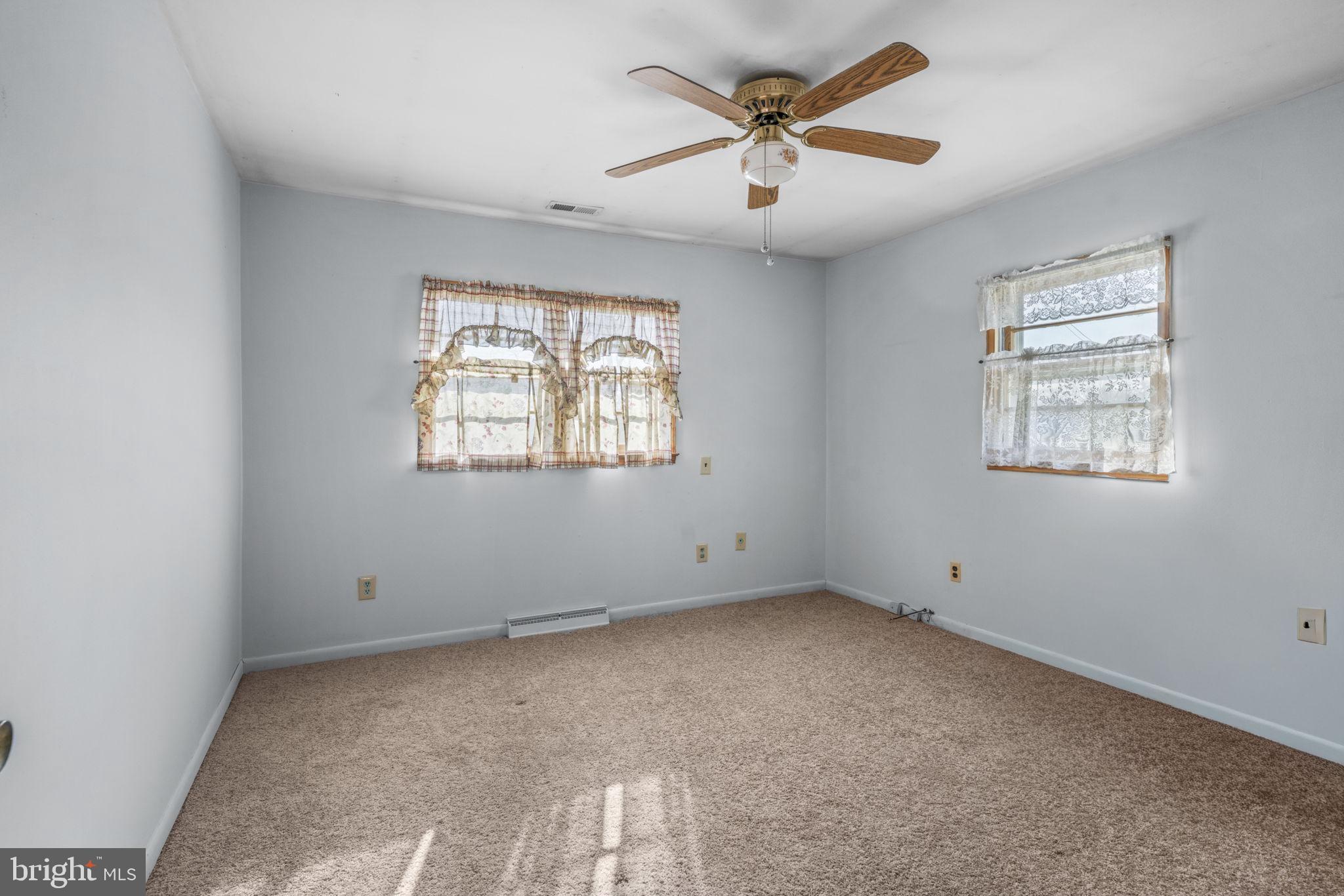 16400 Tanyard Road Upper Marlboro, MD 20772 - Photo 21 of 30 a view of an empty room with a window