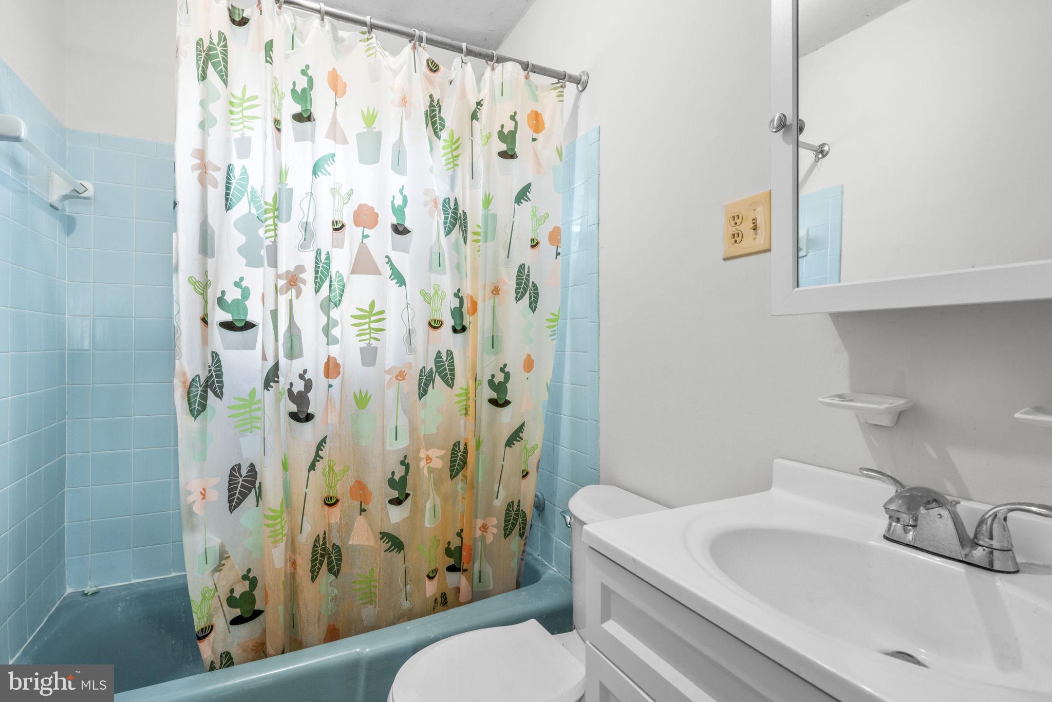 16400 Tanyard Road Upper Marlboro, MD 20772 - Photo 22 of 30 a bathroom with a sink toilet and shower