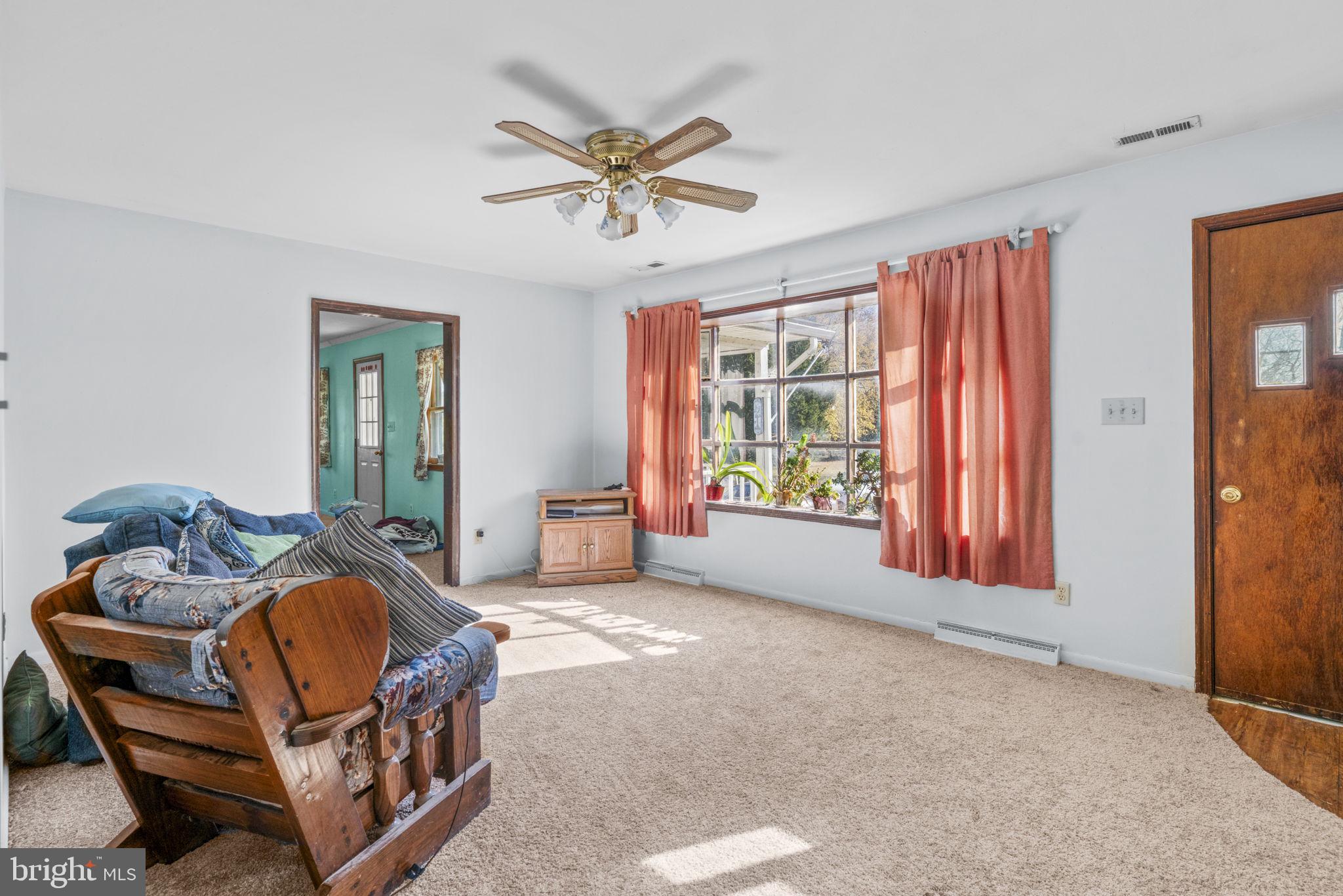 16400 Tanyard Road Upper Marlboro, MD 20772 - Photo 25 of 30 a living room with furniture and a window