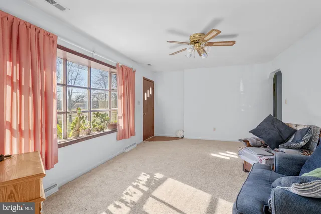 a room with furniture and a chair