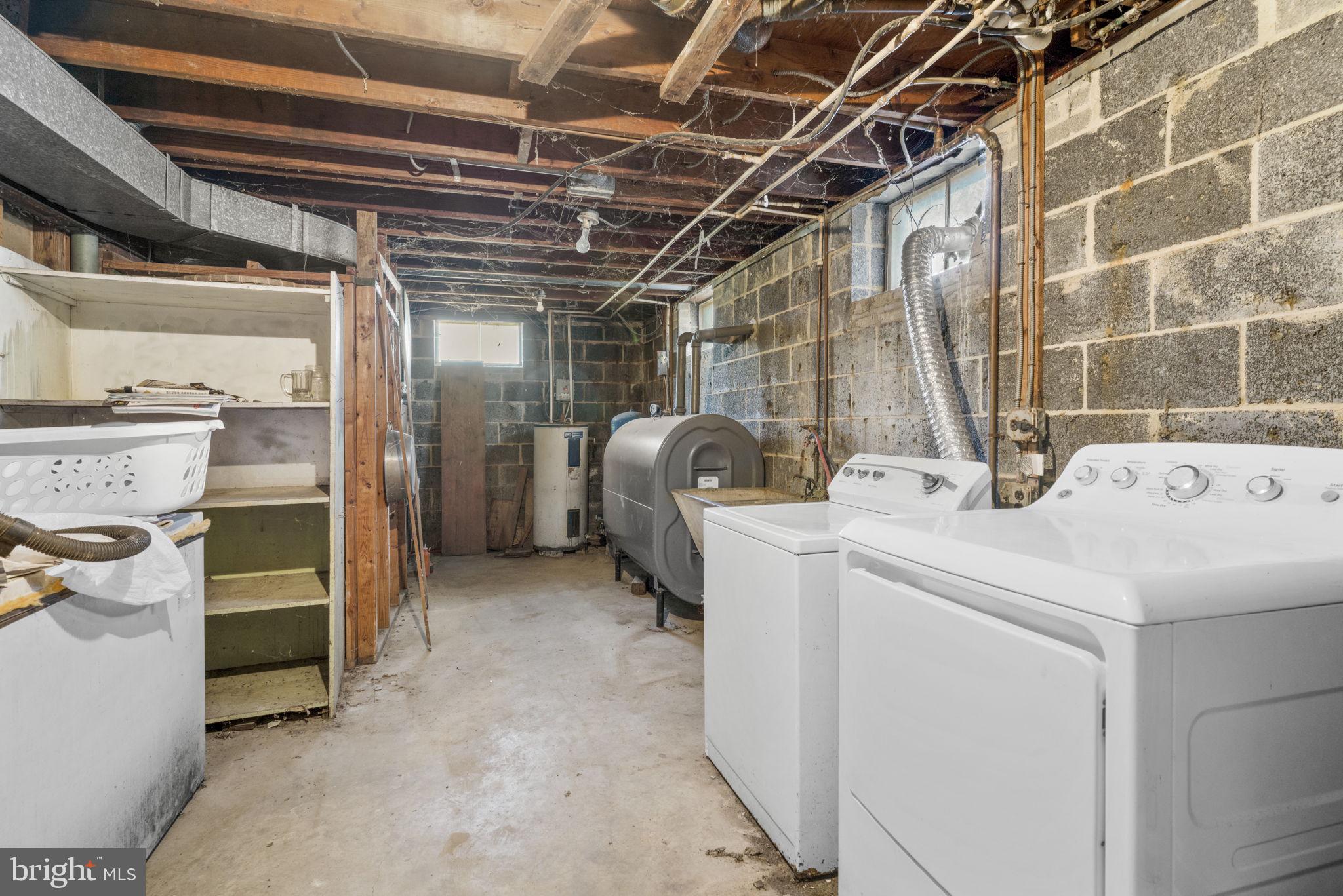 16400 Tanyard Road Upper Marlboro, MD 20772 - Photo 29 of 30 a utility room with dryer and washer