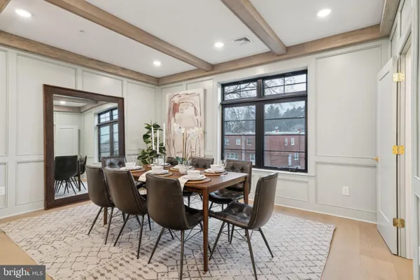 a view of a dining room with furniture