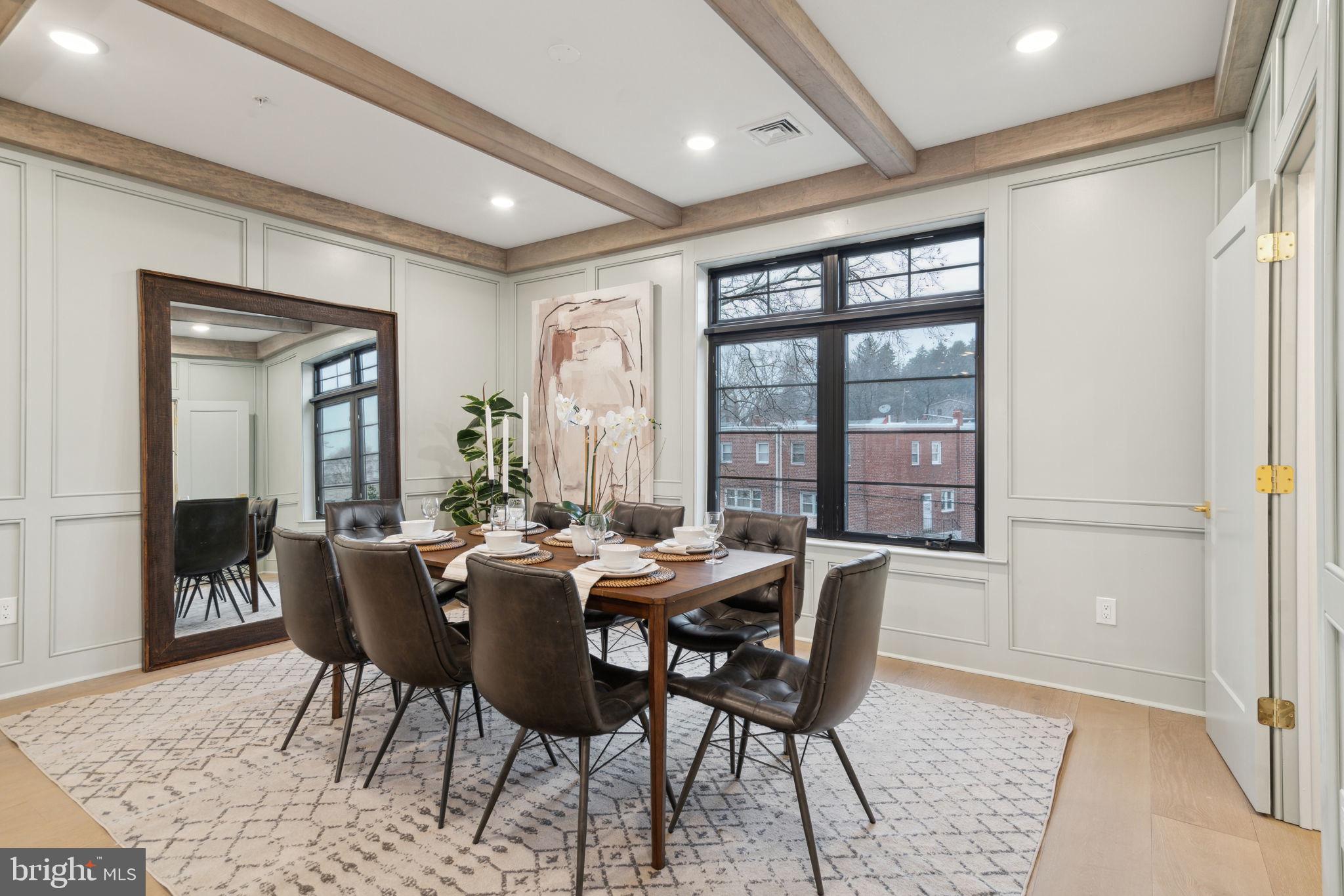 7519 Ridge Avenue, Unit 301 Philadelphia, PA 19128 - Photo 18 of 37 a view of a dining room with furniture