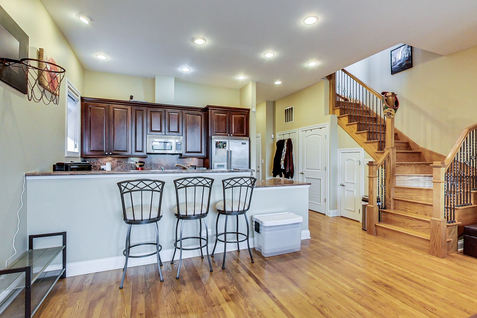 1116 West Hubbard Street, Unit 4W Chicago, IL 60642 - Photo 11 of 32 a view of kitchen with furniture and wooden floor