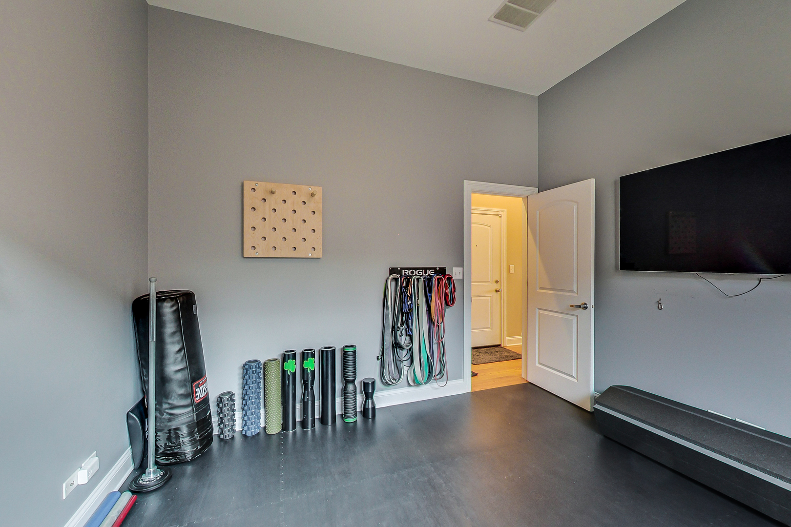 1116 West Hubbard Street, Unit 4W Chicago, IL 60642 - Photo 17 of 32 a view of a livingroom with furniture and a flat screen tv