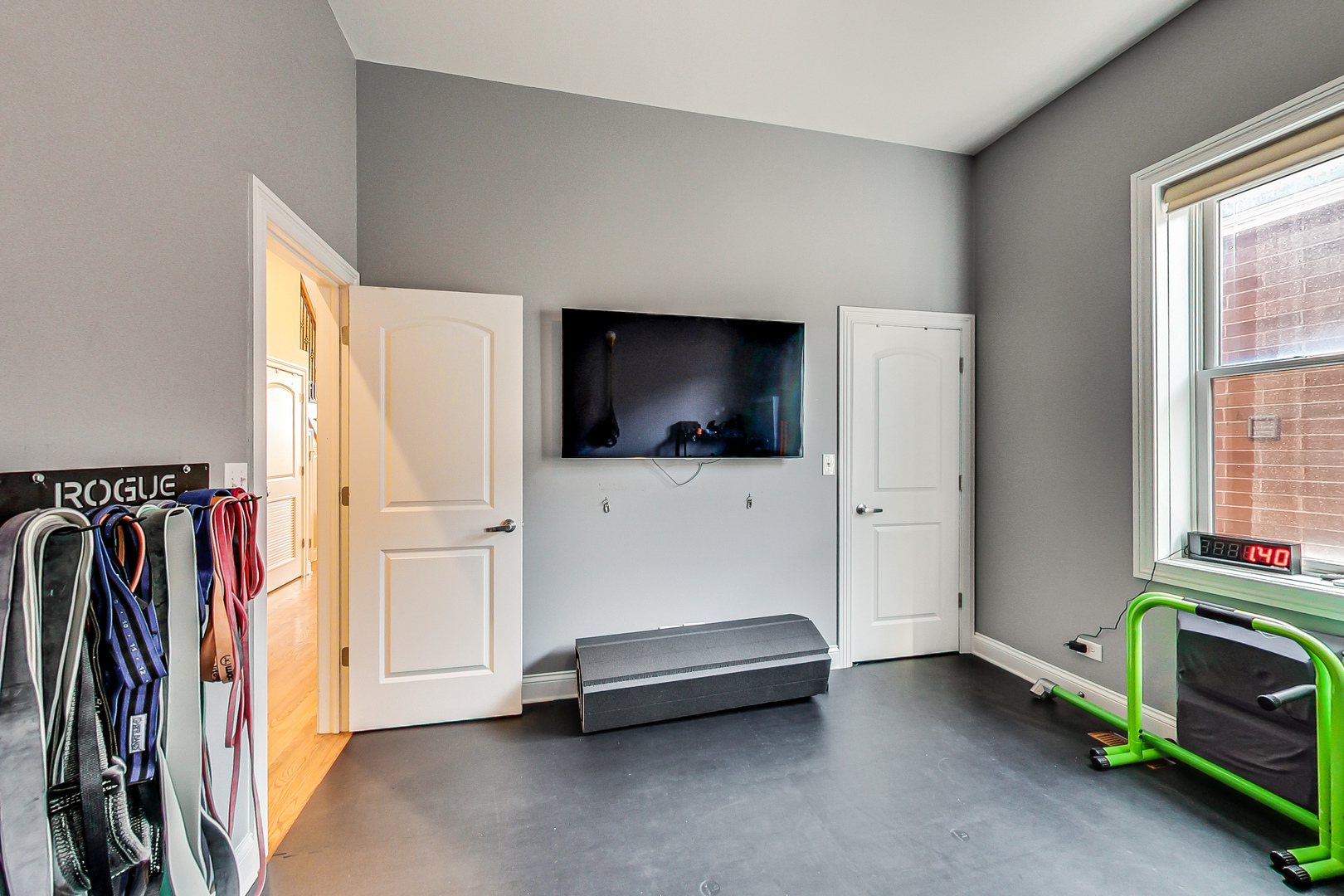 1116 West Hubbard Street, Unit 4W Chicago, IL 60642 - Photo 18 of 32 a view of a livingroom with furniture and a flat screen tv