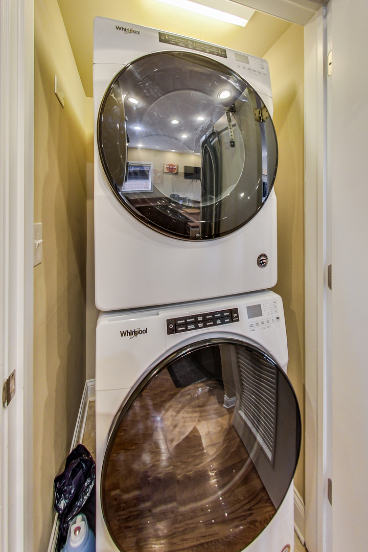 1116 West Hubbard Street, Unit 4W Chicago, IL 60642 - Photo 26 of 32 a utility room with wooden floor