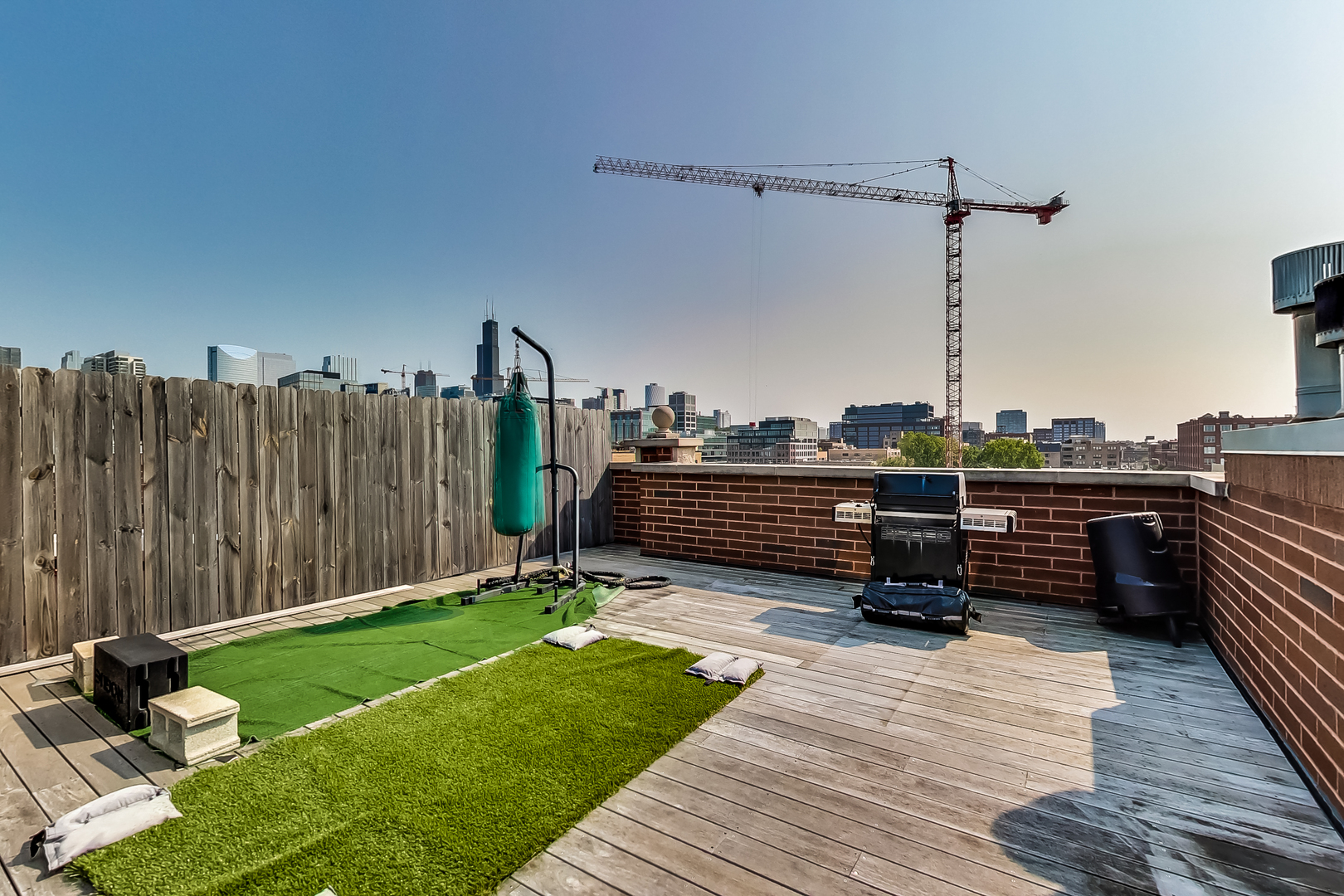 1116 West Hubbard Street, Unit 4W Chicago, IL 60642 - Photo 28 of 32 a view of a terrace with chairs