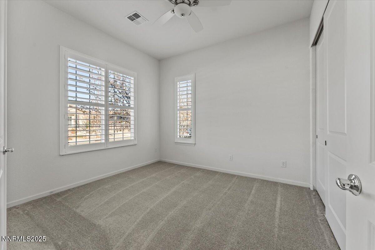 2250 Trakehner Lane Reno, NV 89521 - Photo 15 of 51 a view of an empty room with a window