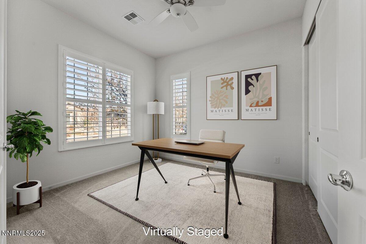 2250 Trakehner Lane Reno, NV 89521 - Photo 16 of 51 a view of a livingroom with furniture and window