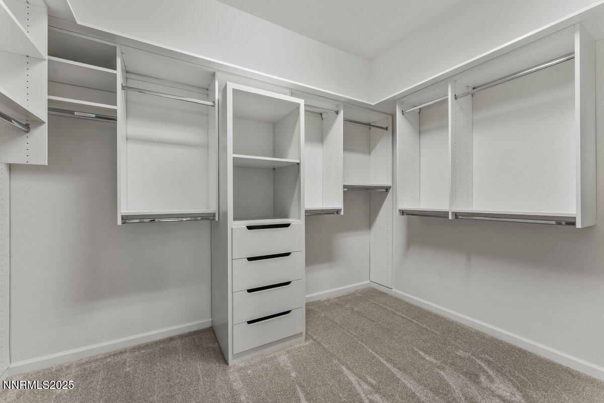 2250 Trakehner Lane Reno, NV 89521 - Photo 23 of 51 a view of walk in closet with empty racks
