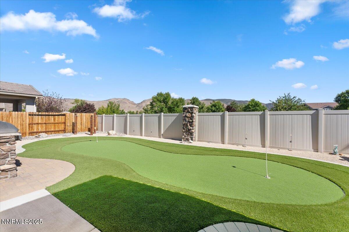 2250 Trakehner Lane Reno, NV 89521 - Photo 35 of 51 a view of a backyard with a garden and plants