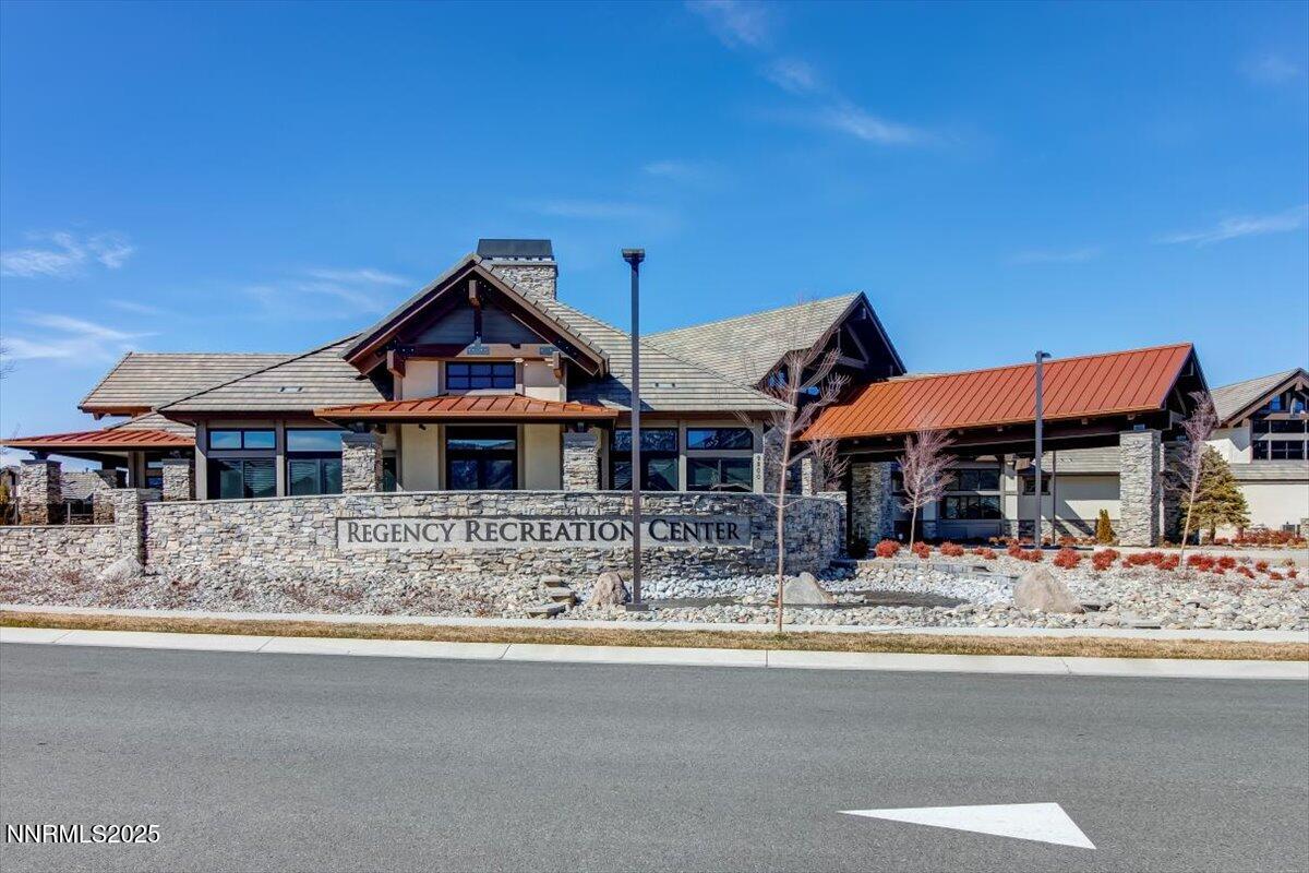 2250 Trakehner Lane Reno, NV 89521 - Photo 38 of 51 a front view of a house with large trees