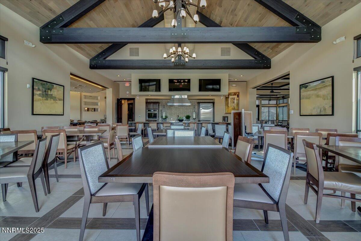 2250 Trakehner Lane Reno, NV 89521 - Photo 43 of 51 a view of a dining room with furniture and chandelier