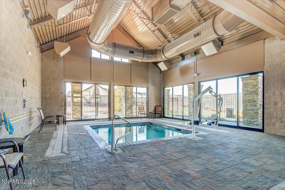 2250 Trakehner Lane Reno, NV 89521 - Photo 49 of 51 a view of an empty room with a balcony