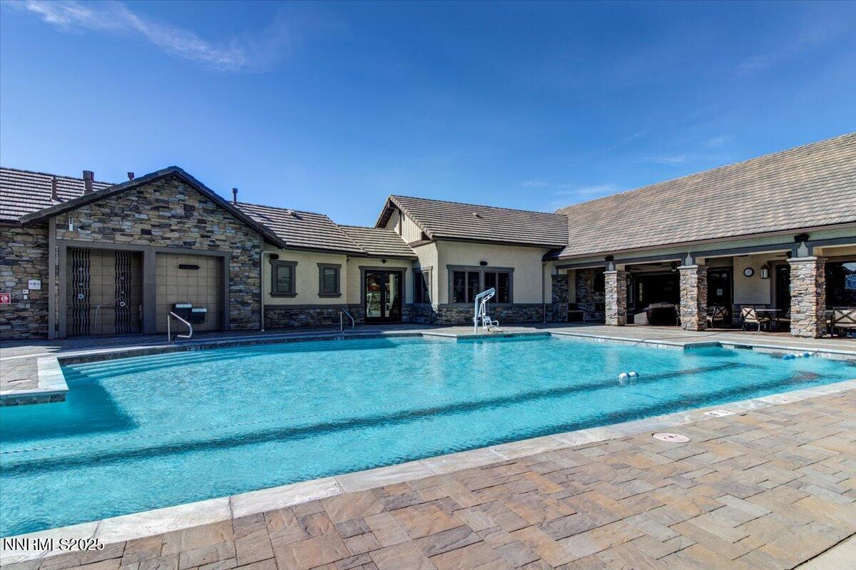 2250 Trakehner Lane Reno, NV 89521 - Photo 50 of 51 front view of a house with a yard