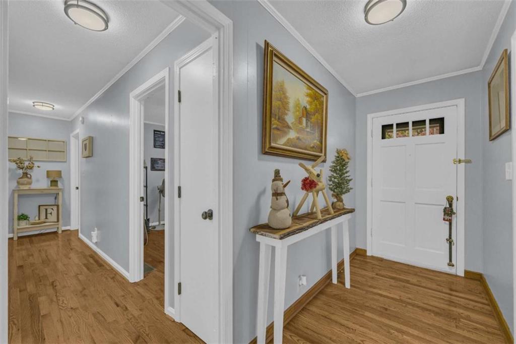 97 Williams Street Toccoa, GA 30577 - Photo 24 of 55 a view of a hallway to a livingroom with furniture